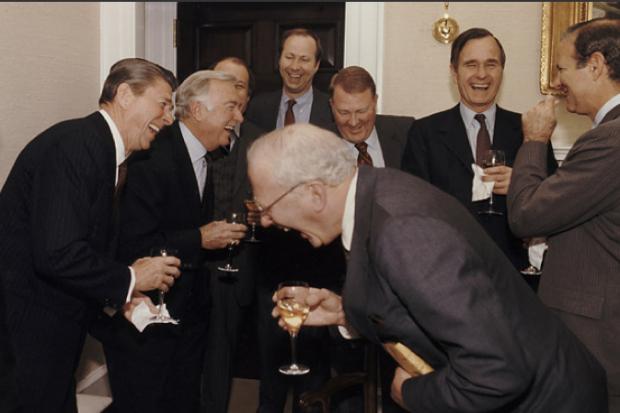 Rich men laughing